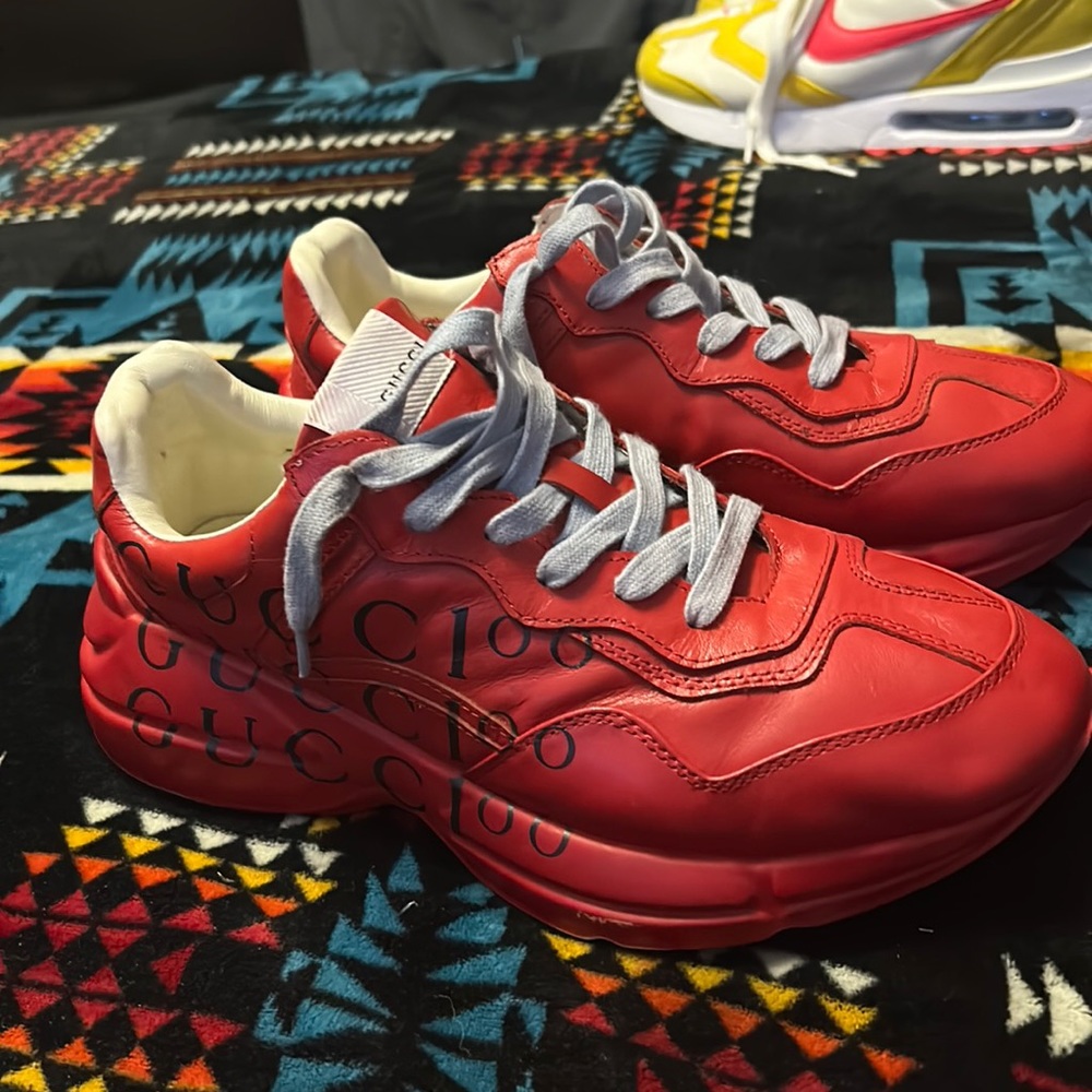 Male size 10 Gucci sneakers. They are red and very comfortable.